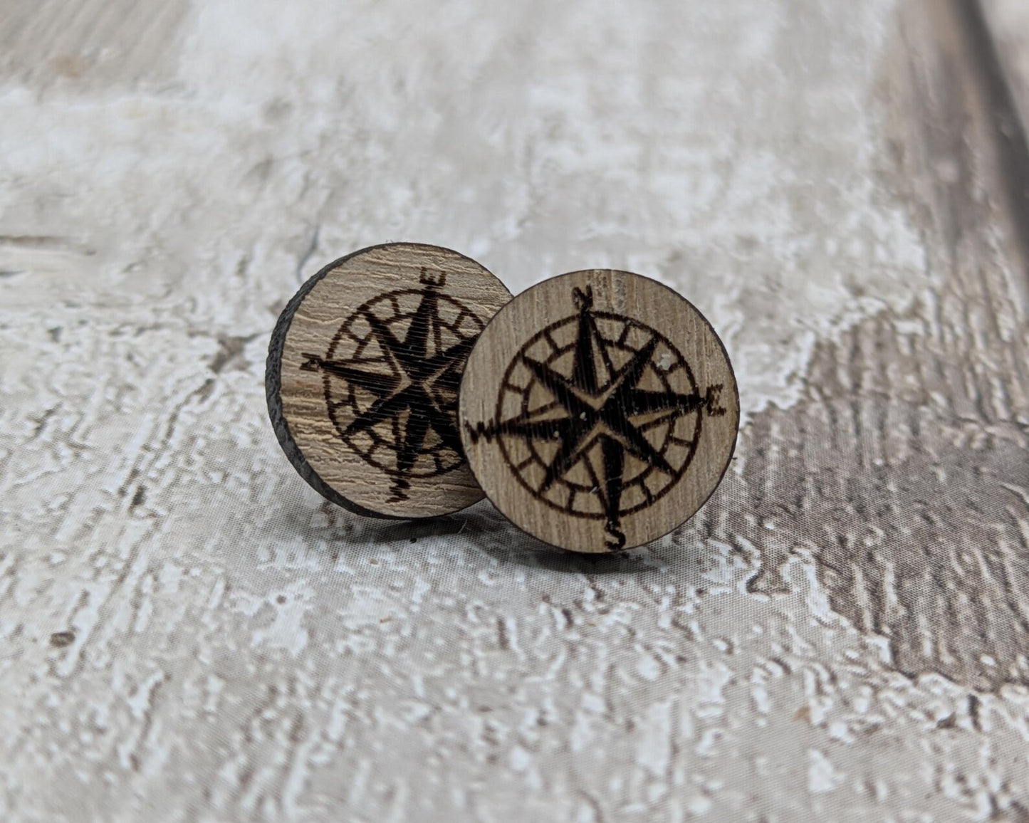 Sweet chestnut compass stud earrings with stainless steel findings.