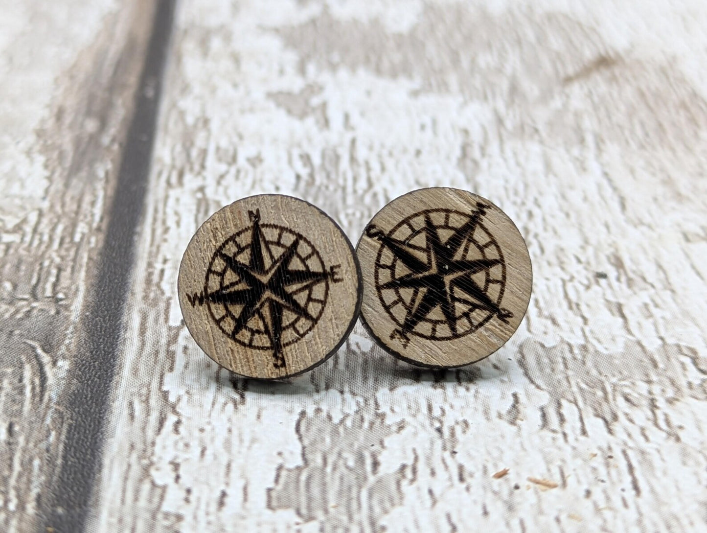Sweet chestnut compass stud earrings with stainless steel findings.