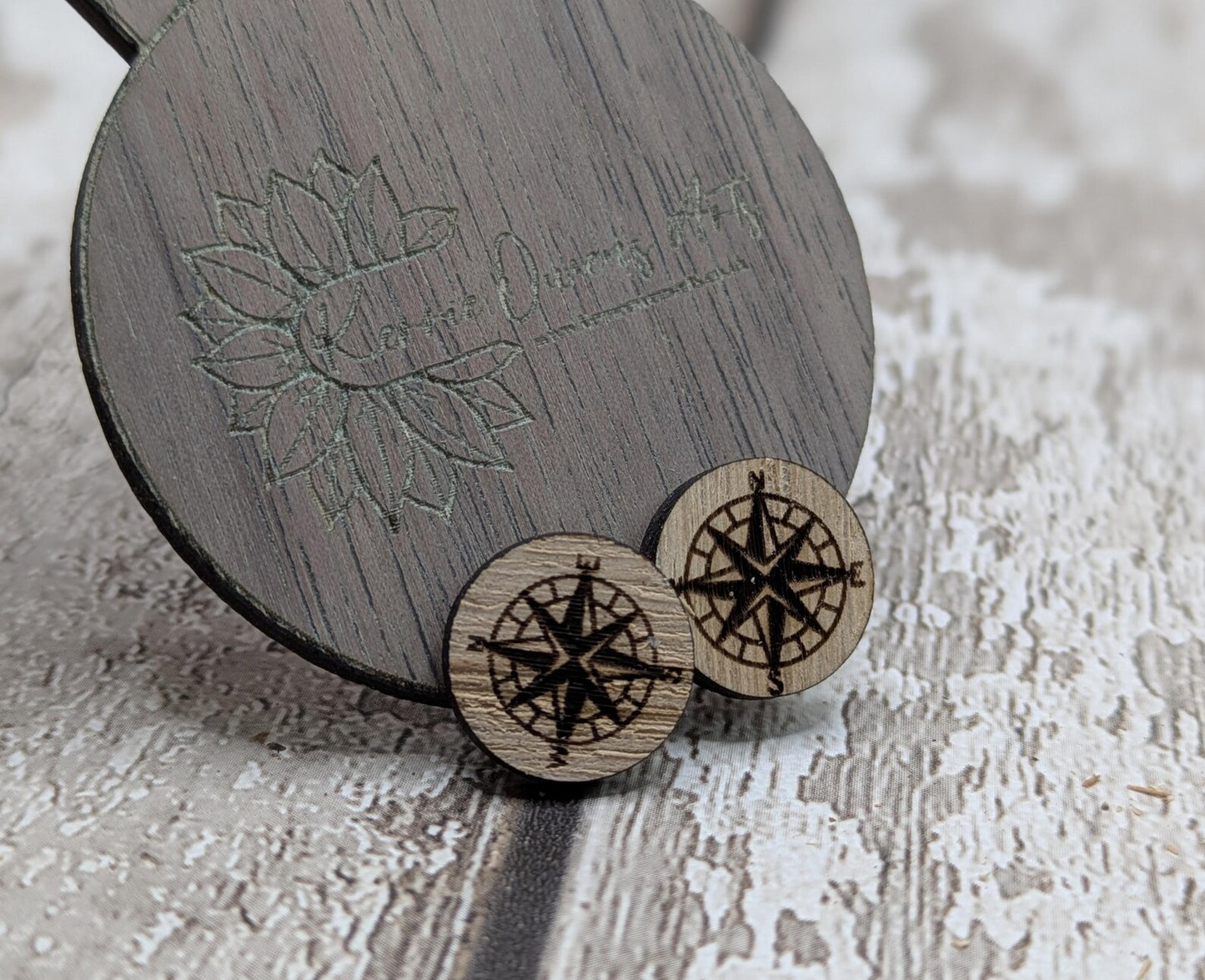 Sweet chestnut compass stud earrings with stainless steel findings.