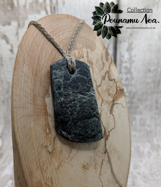 raw serpentine pounamu pendant -natural unpolished New Zealand Aotearoa pebble jewellery.