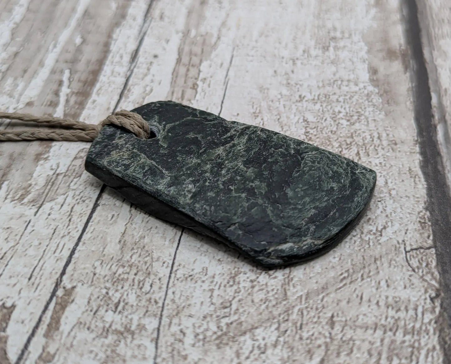 raw serpentine pounamu pendant -natural unpolished New Zealand Aotearoa pebble jewellery.