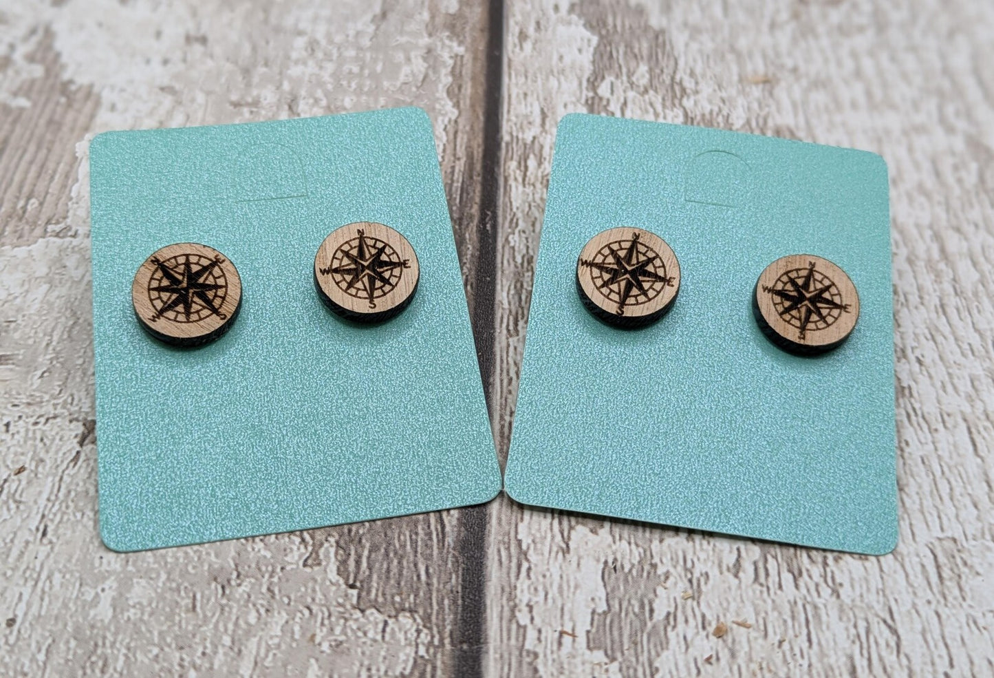 Sweet chestnut compass stud earrings with stainless steel findings.