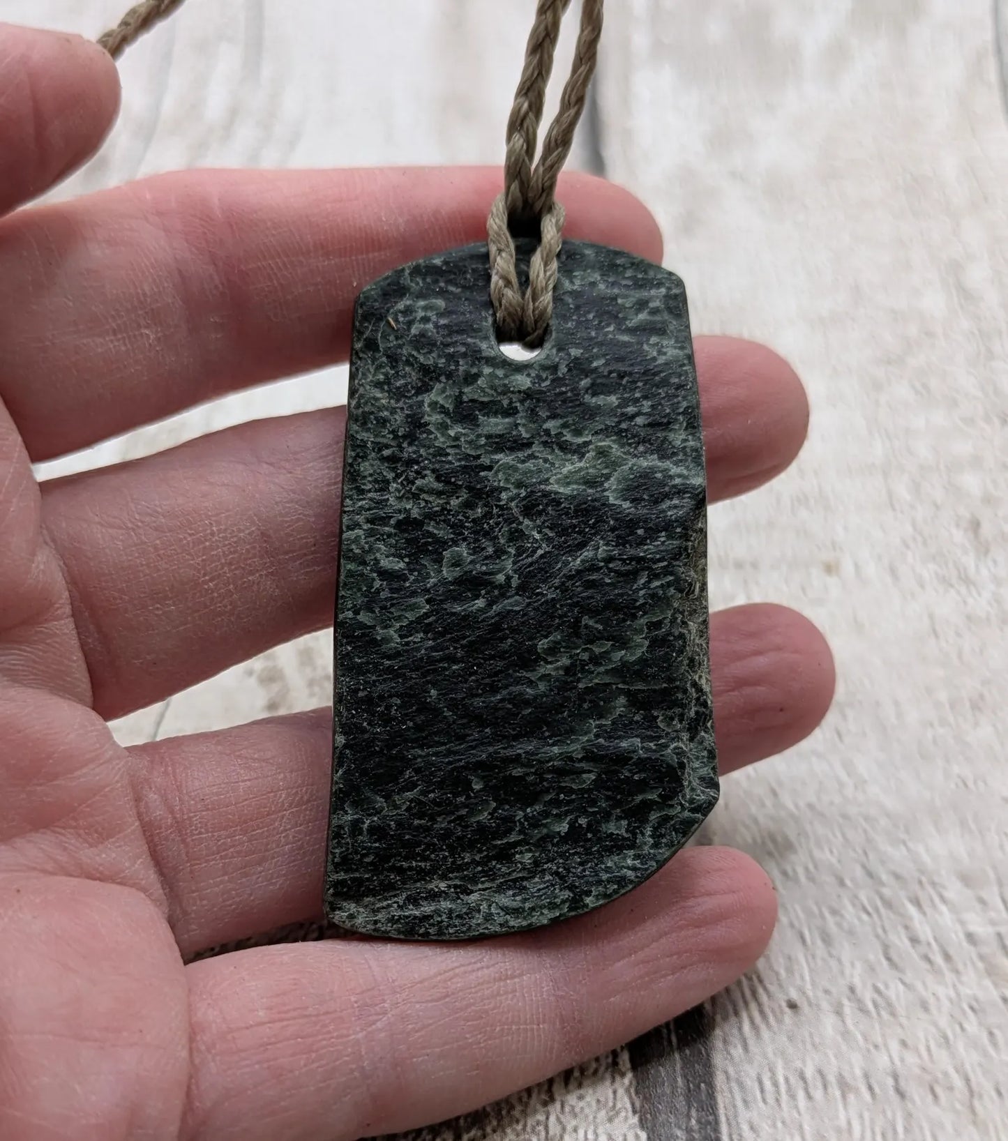 raw serpentine pounamu pendant -natural unpolished New Zealand Aotearoa pebble jewellery.