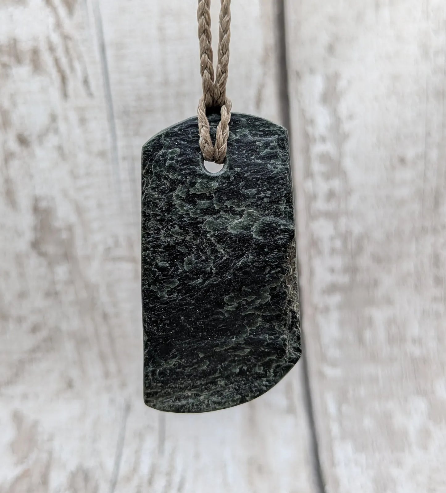 raw serpentine pounamu pendant -natural unpolished New Zealand Aotearoa pebble jewellery.