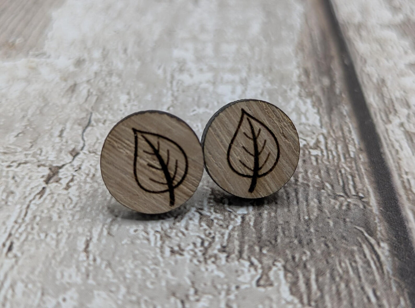 Sweet chestnut leaf studs with stainless steel findings.