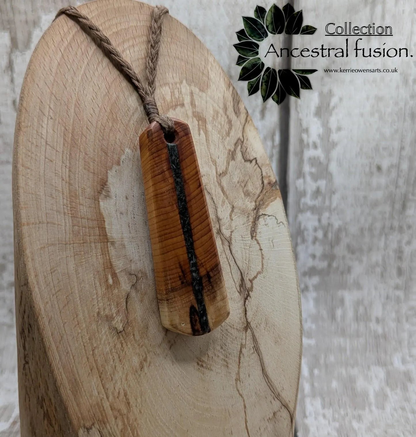 Yew wood roimata drop pendant with Aotea inlay.