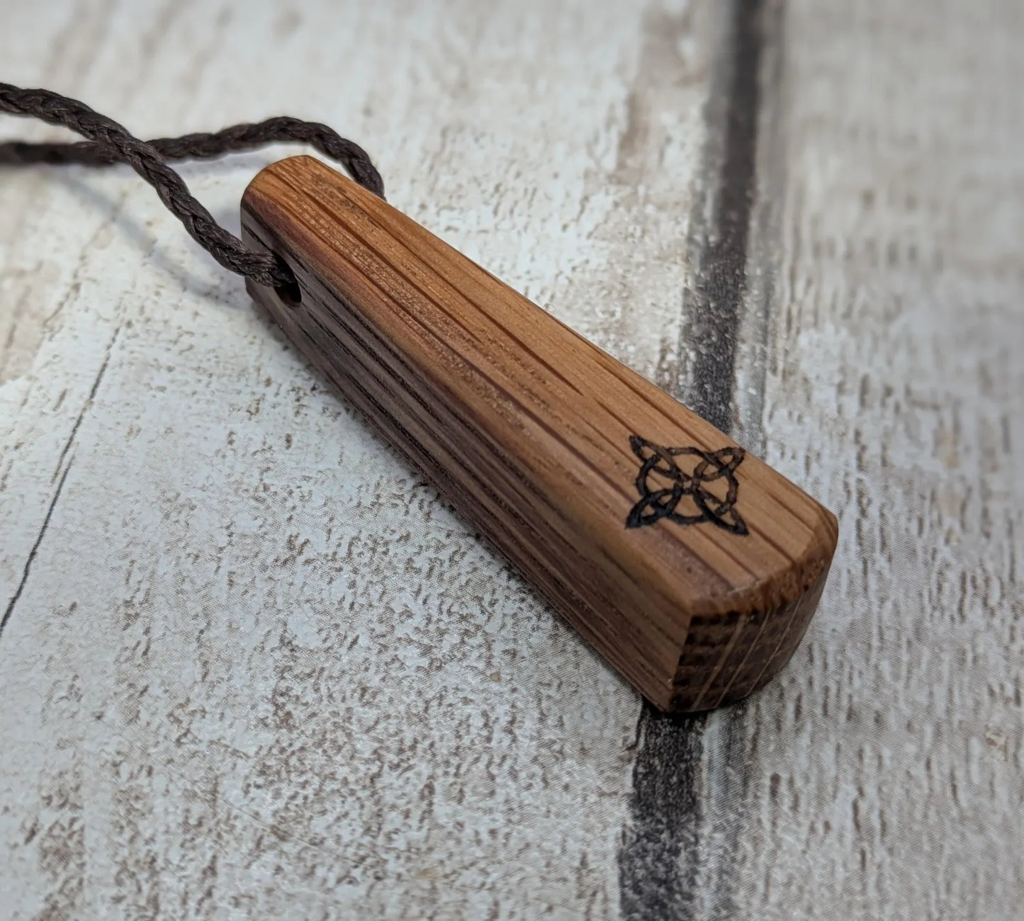 Whiskey barrel oak tear drop pendant with laser printed with rune symbol.