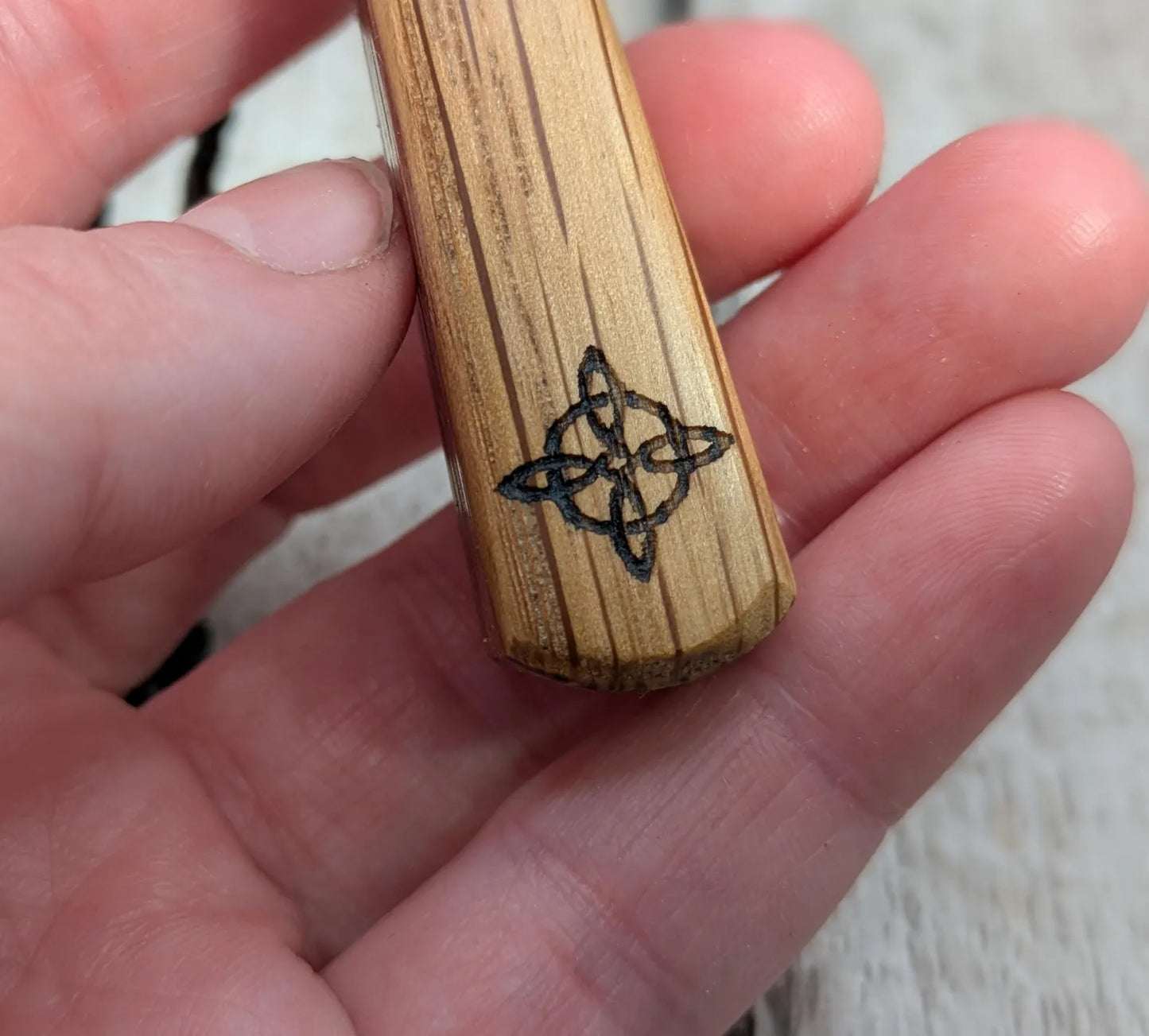 Whiskey barrel oak tear drop pendant with laser printed with rune symbol.