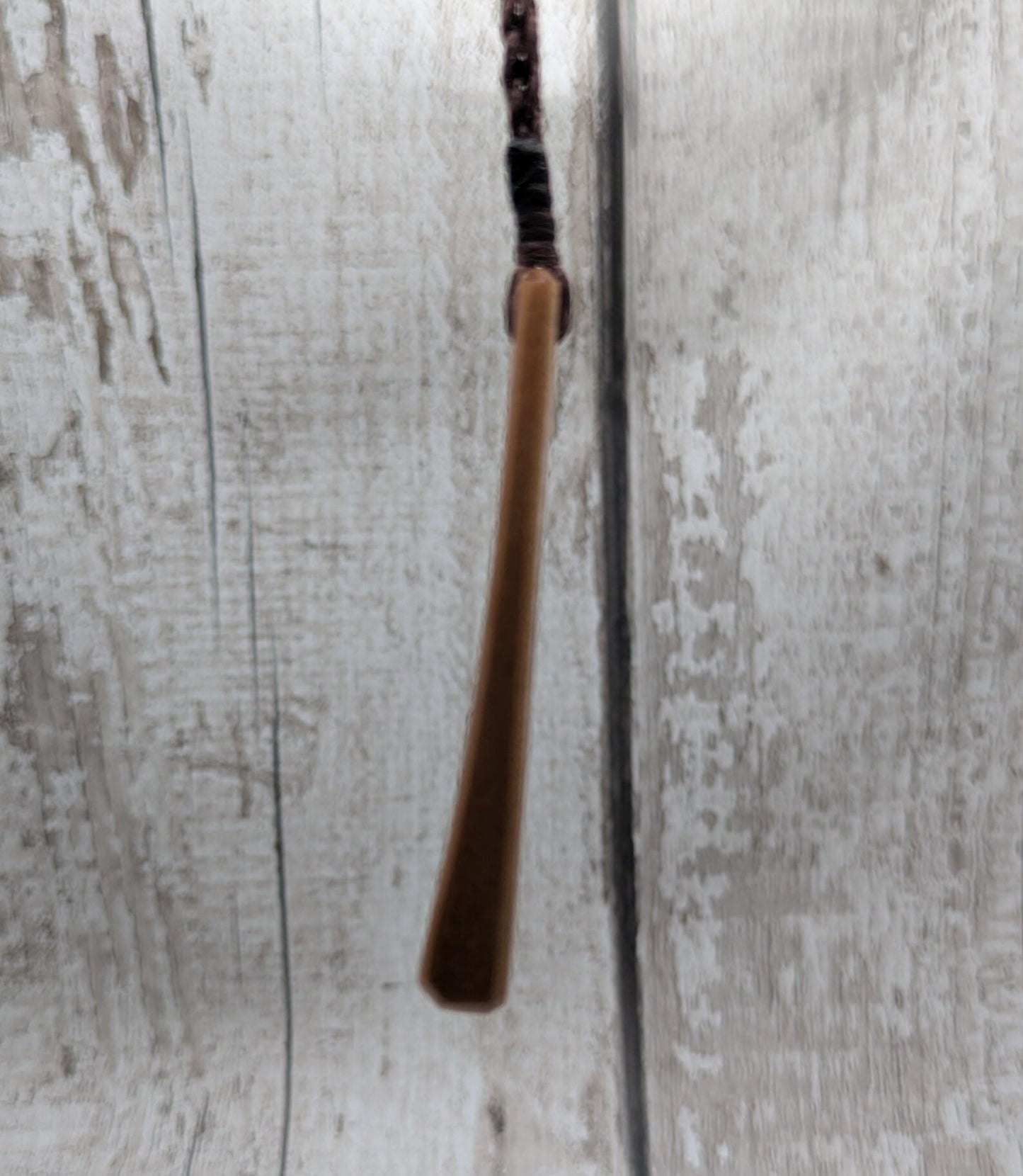 NZ Swamp Kauri wood pendant with rainbow pāua shell.