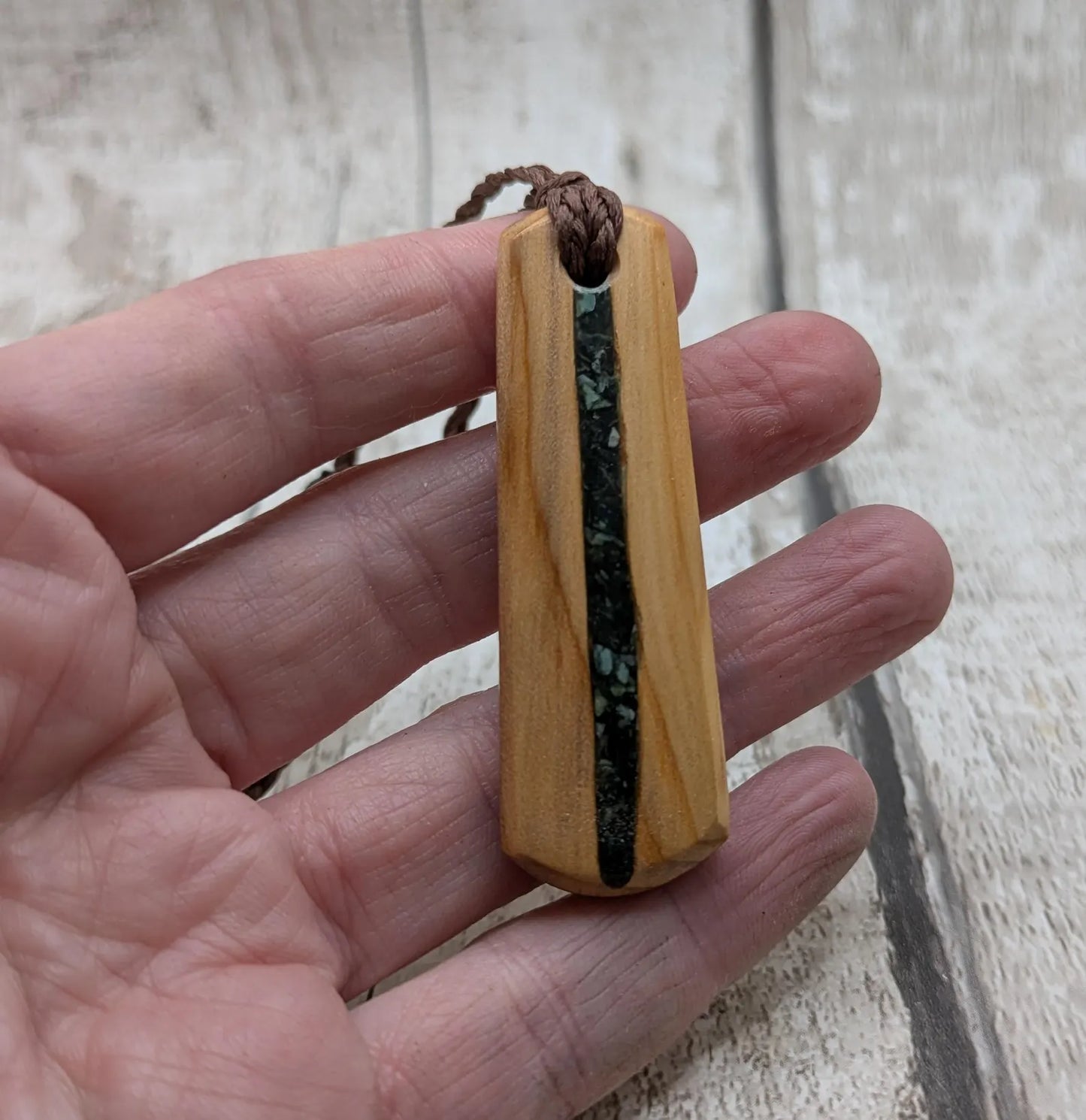 Made to order Yew wood toki style pendant with mixed pounamu greenstone inlay - Handcrafted British jewellery, Māori inspired nature talisman.