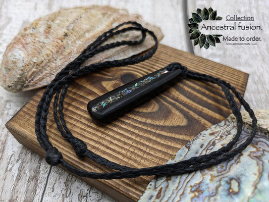 Made to order Fenland bog oak roimata drop pendant with NZ rainbow Pāua shell.