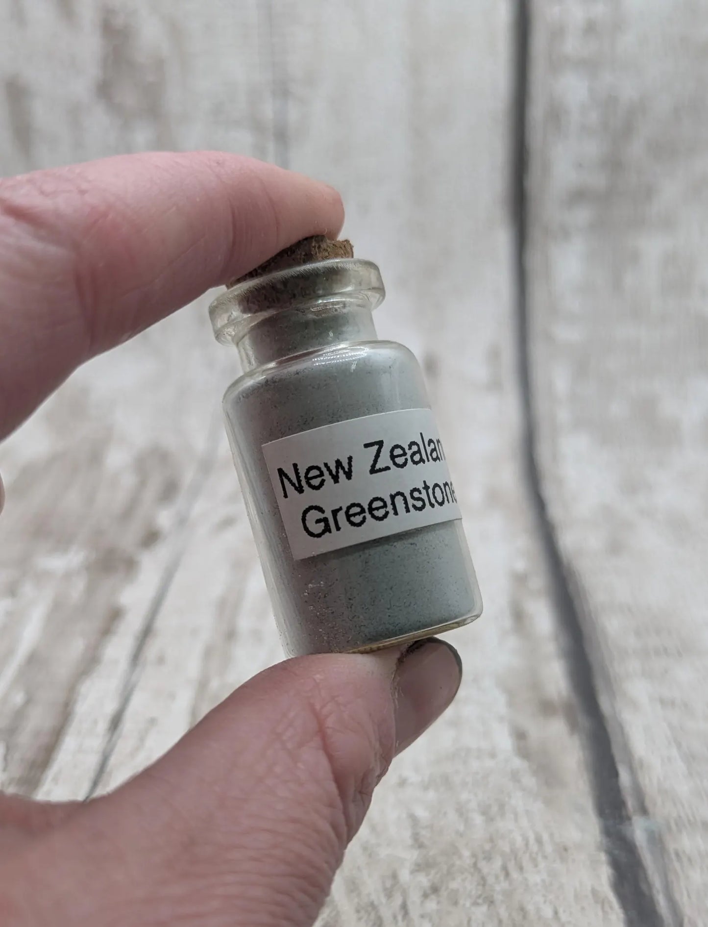 Unrefined powdered New Zealand Pounamu greenstone pigment.