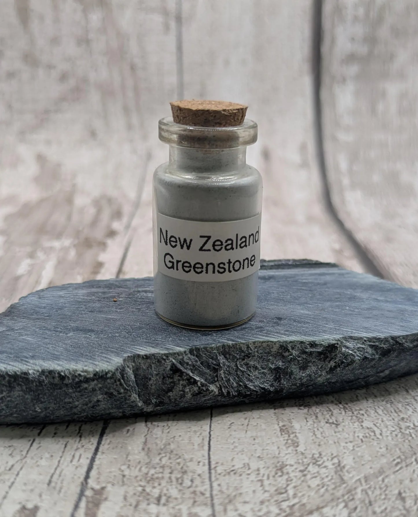 Unrefined powdered New Zealand Pounamu greenstone pigment.