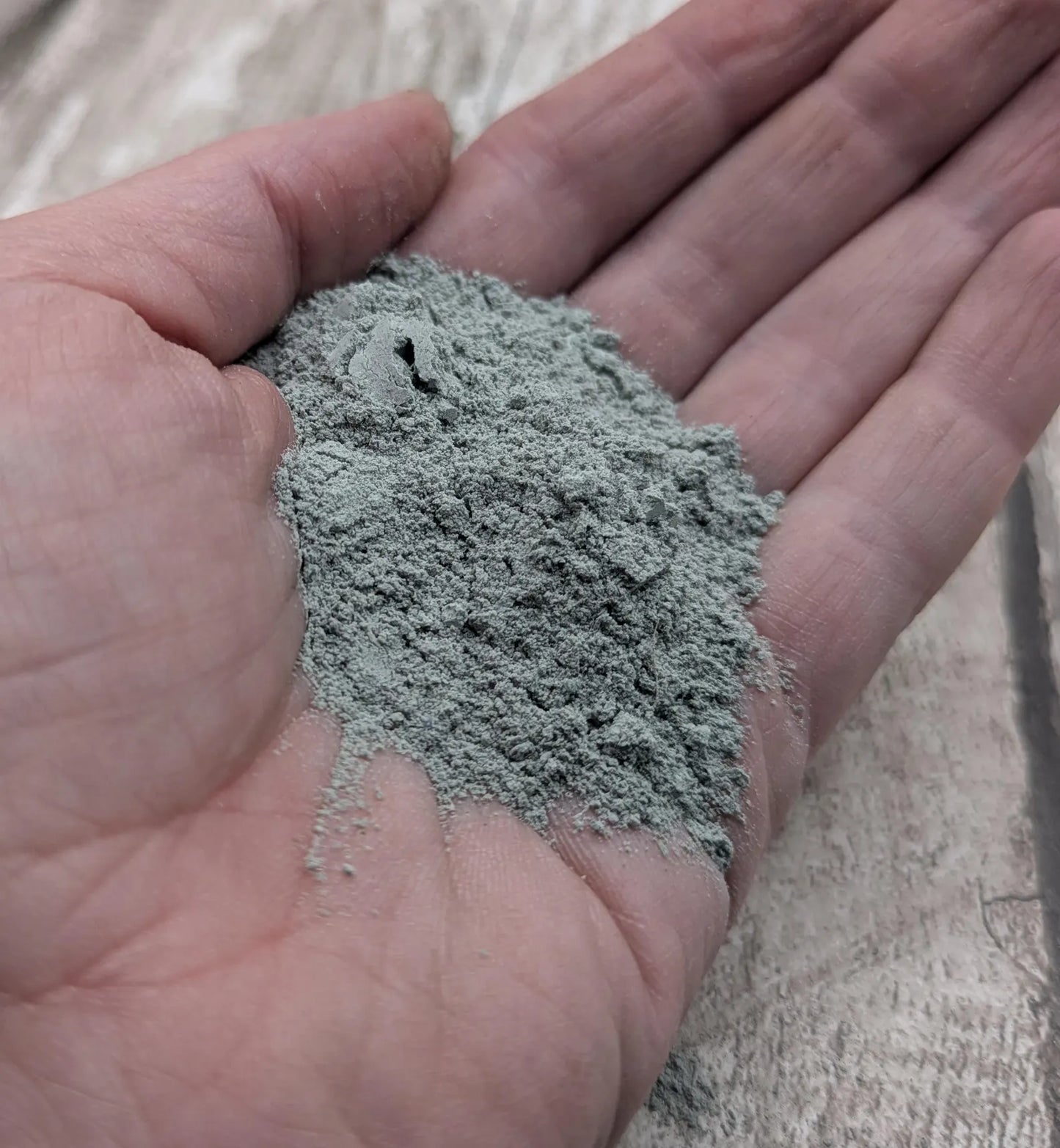 Unrefined powdered New Zealand Pounamu greenstone pigment.