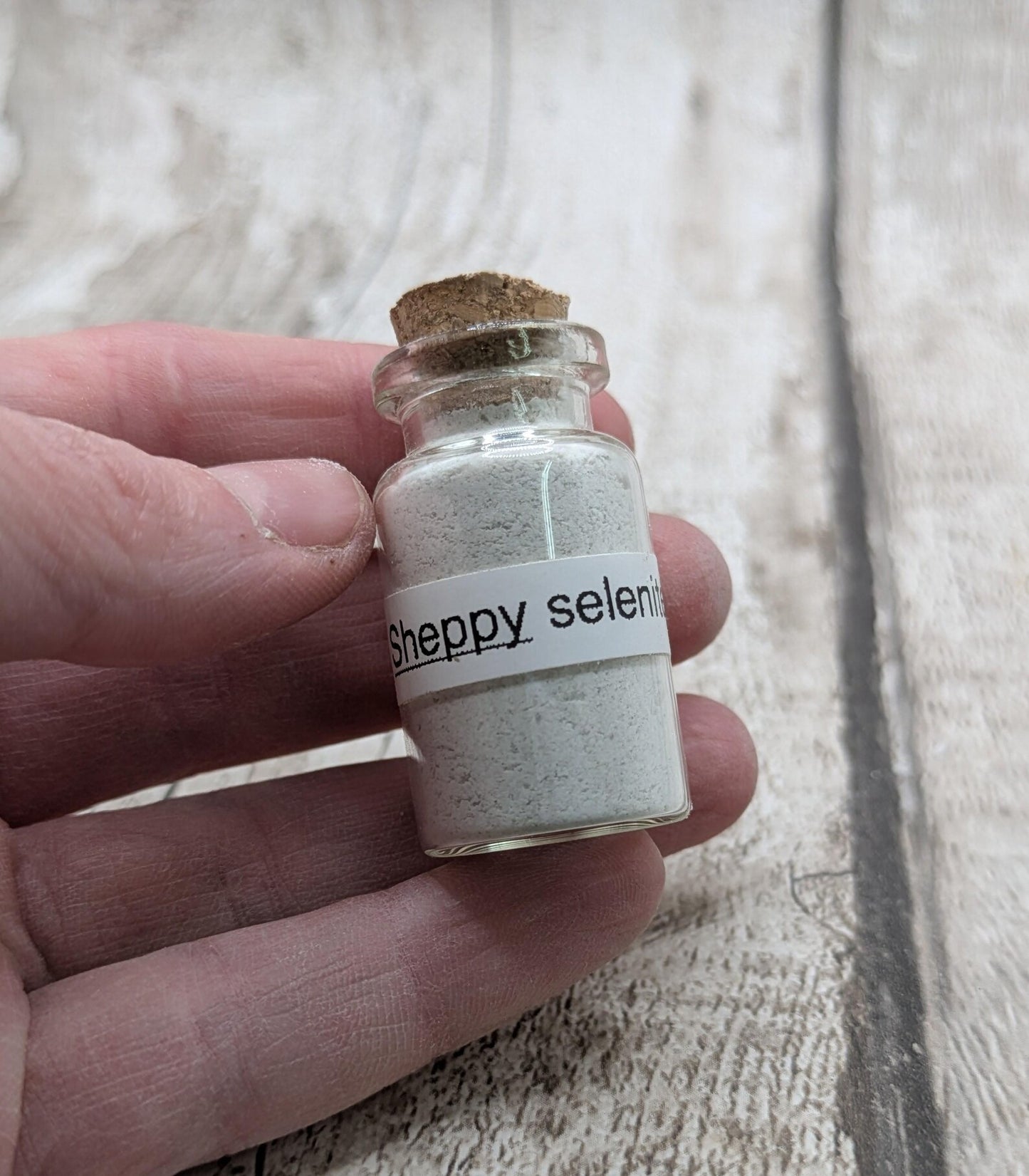 Unrefined powdered sheppy selenite paint pigment.
