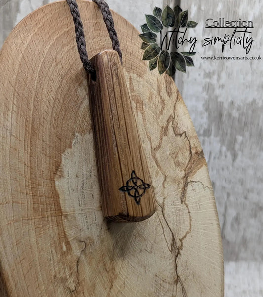 Whiskey barrel oak tear drop pendant with laser printed with rune symbol.