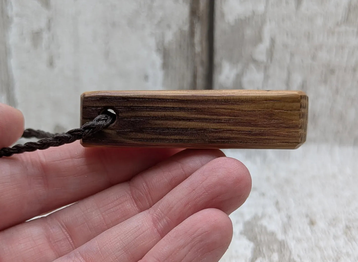 Whiskey barrel oak tear drop pendant with laser printed with rune symbol.