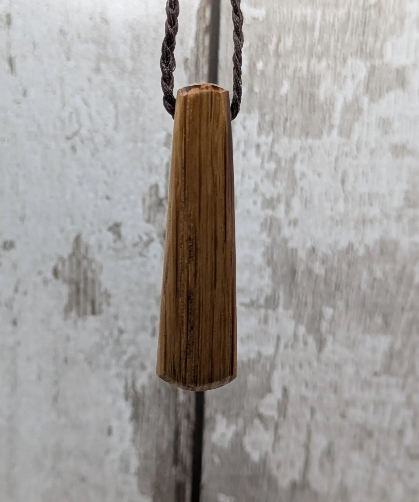 Whiskey barrel oak tear drop pendant with laser printed with rune symbol.