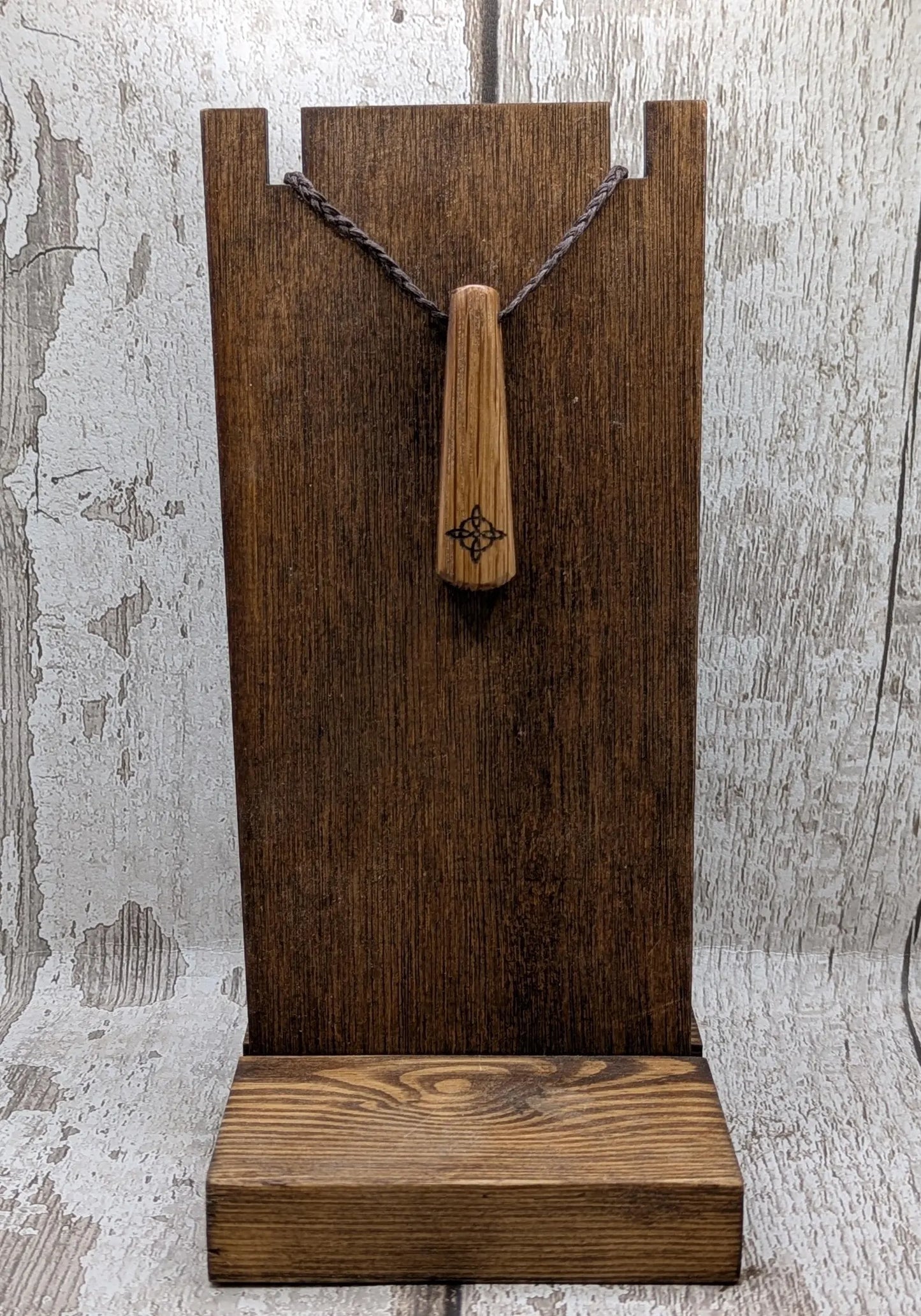 Whiskey barrel oak tear drop pendant with laser printed with rune symbol.