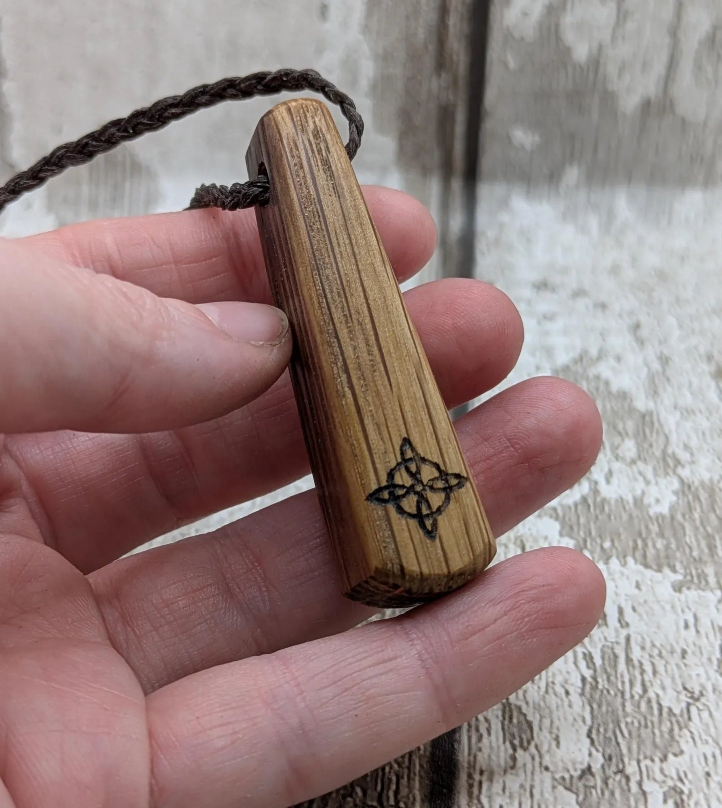 Whiskey barrel oak tear drop pendant with laser printed with rune symbol.