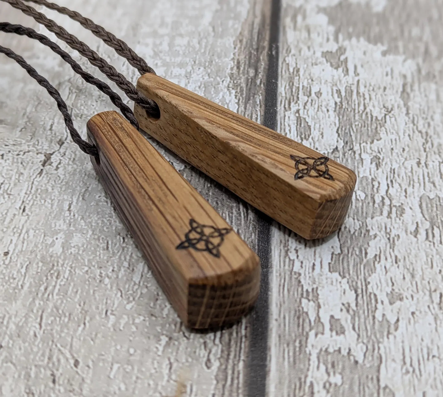 Whiskey barrel oak tear drop pendant with laser printed with rune symbol.