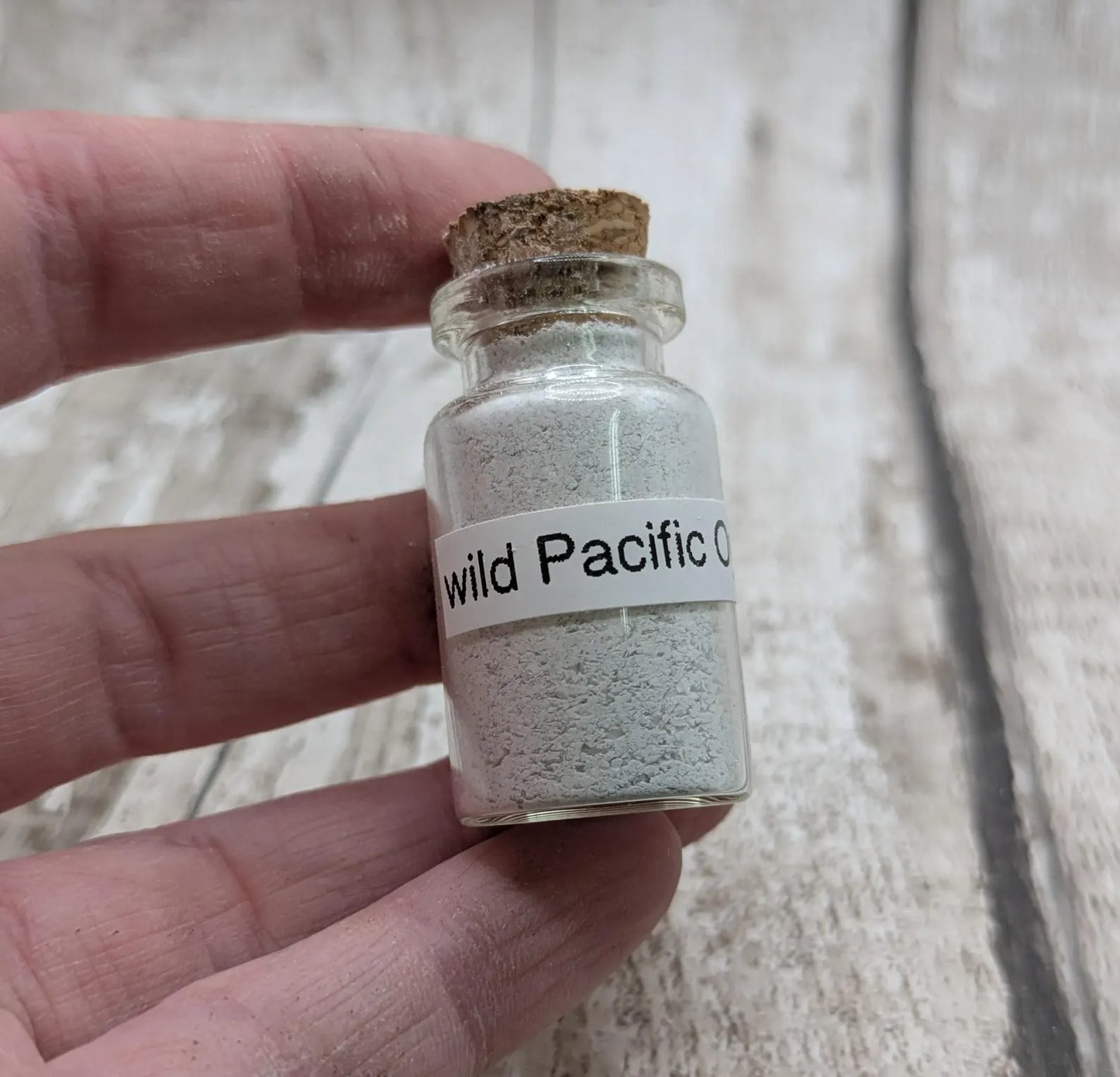 unrefined Pacific Oyster powder pigment with purple tint.