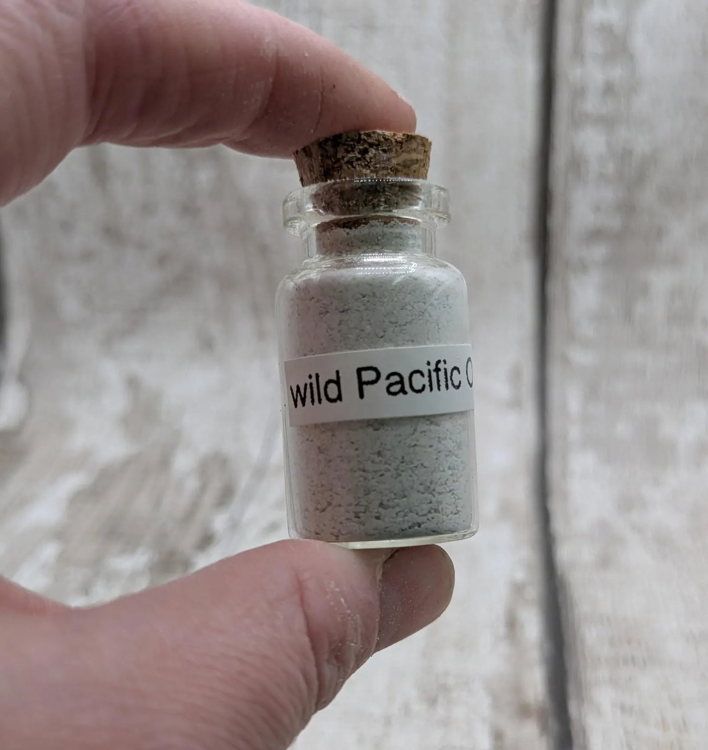 unrefined Pacific Oyster powder pigment with purple tint.