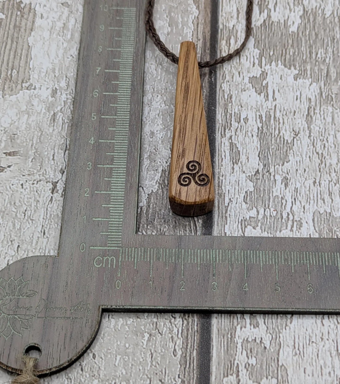 Whiskey Barrel Oak Teardrop laser printed triskele pendant.