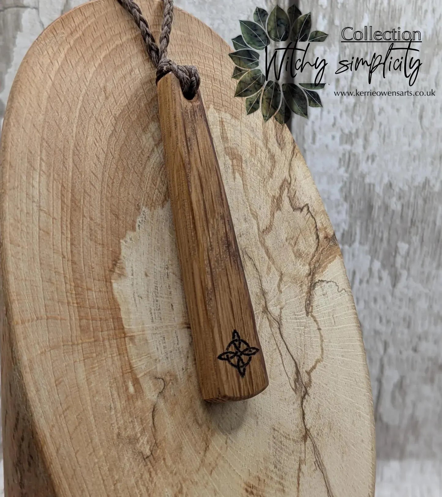 Whiskey barrel oak tear drop pendant with laser printed with rune symbol.