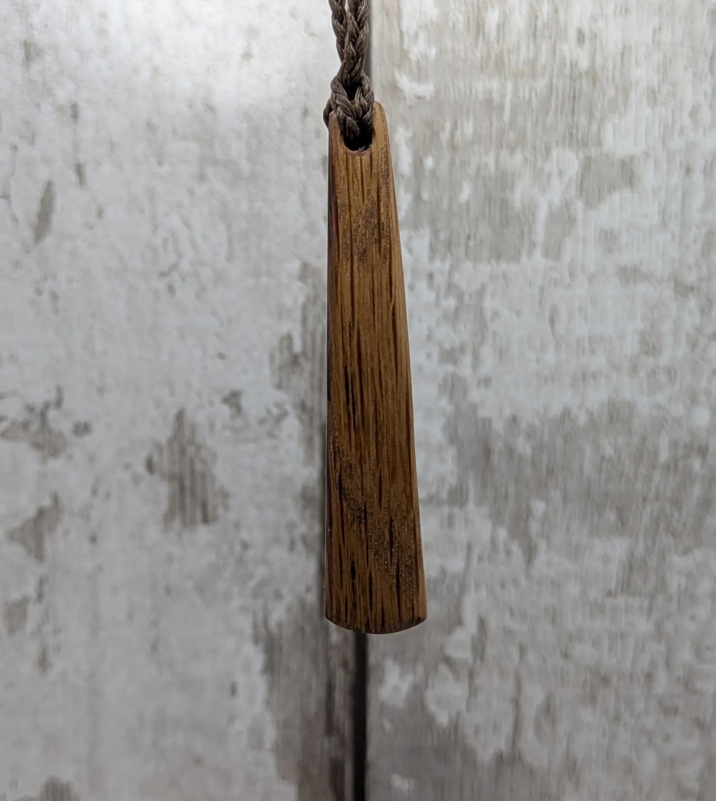 Whiskey barrel oak tear drop pendant with laser printed with rune symbol.