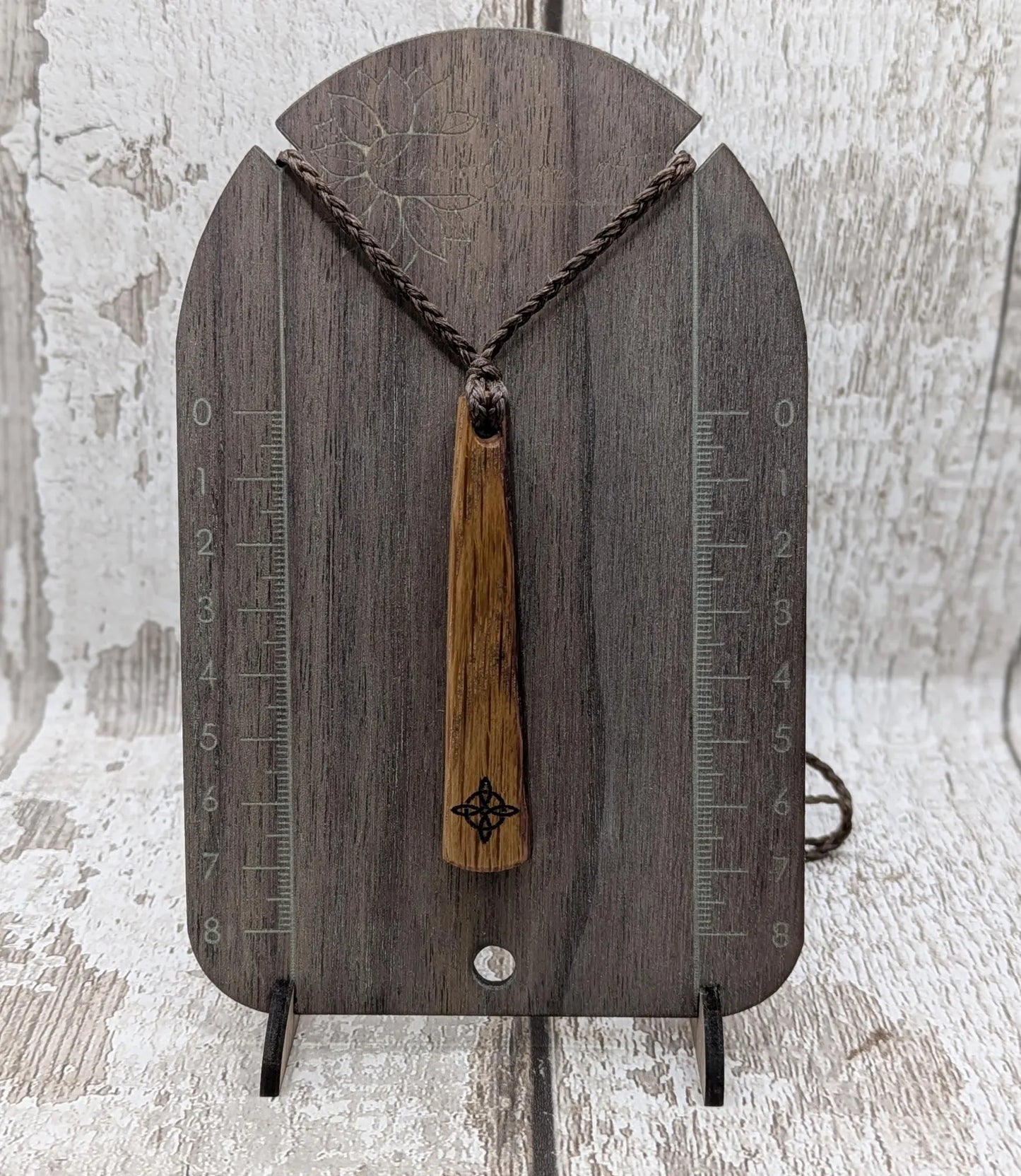 Whiskey barrel oak tear drop pendant with laser printed with rune symbol.