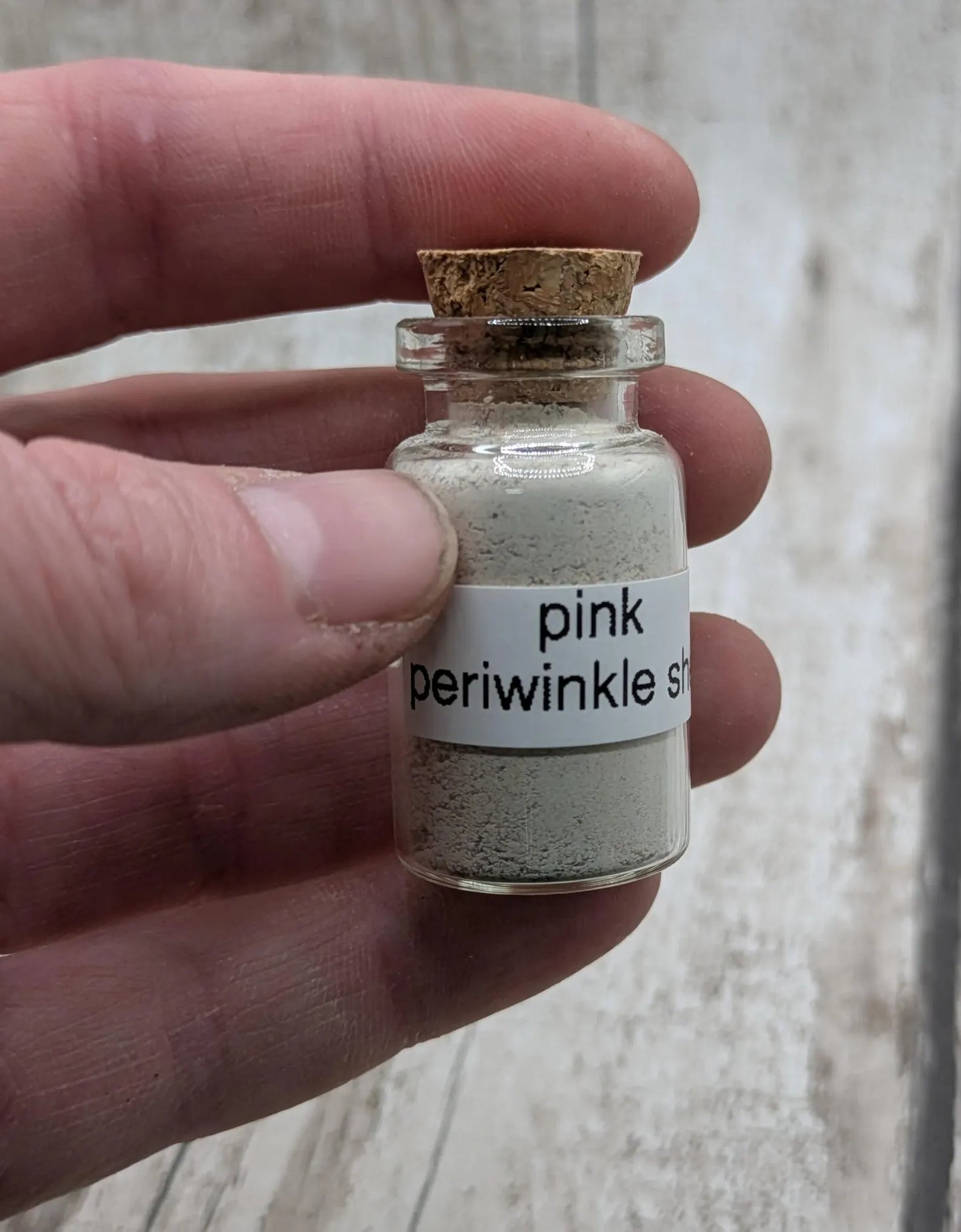Unrefined powdered pink periwinkle shell pigment.