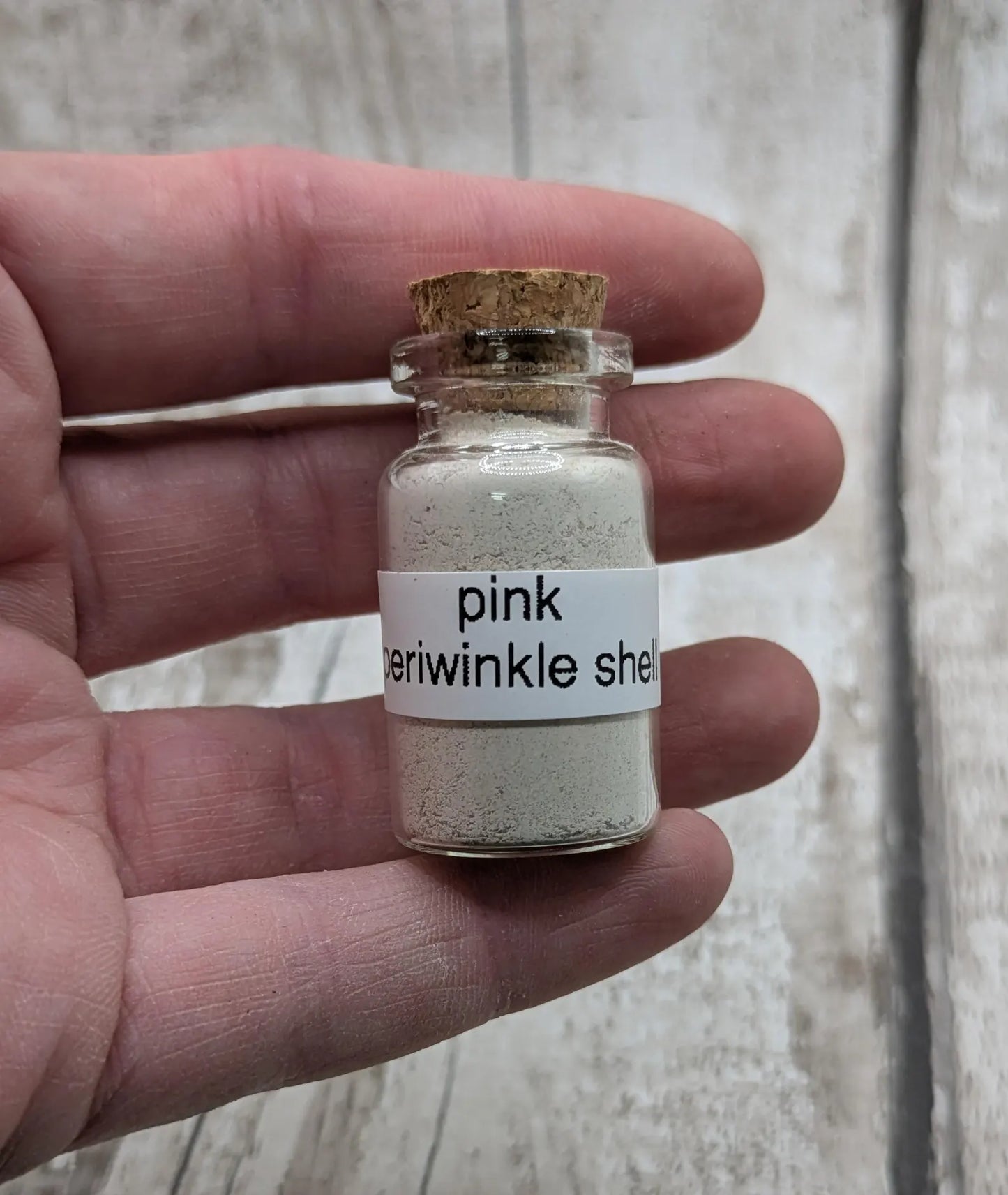 Unrefined powdered pink periwinkle shell pigment.
