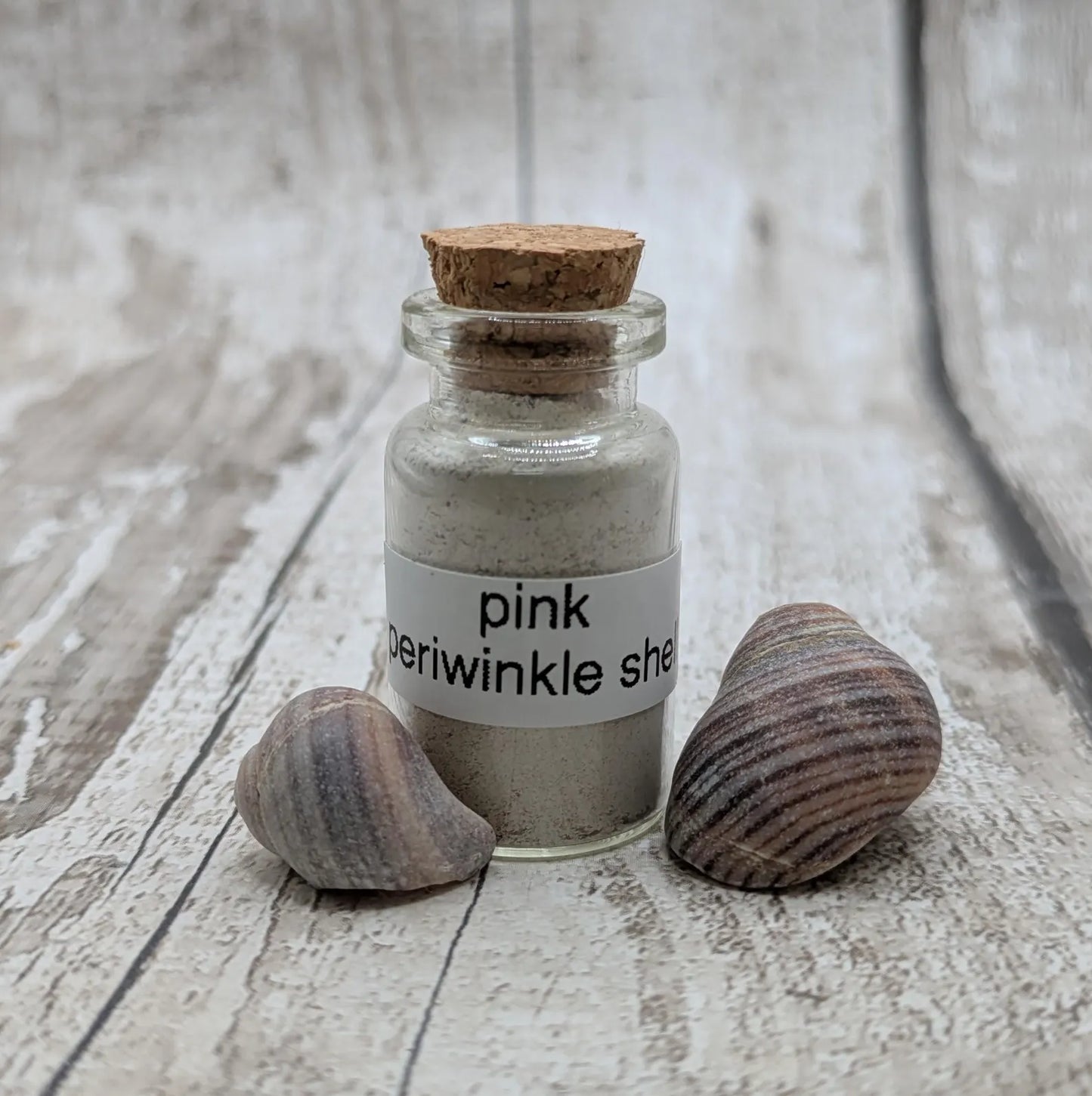 Unrefined powdered pink periwinkle shell pigment.