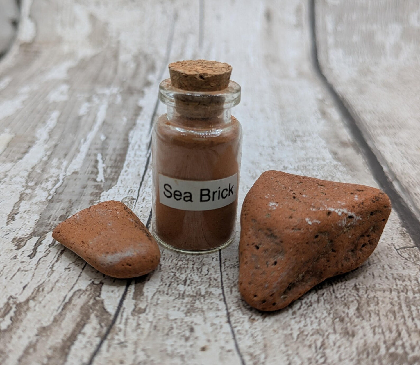 Unrefined powdered sea brick paint pigment.