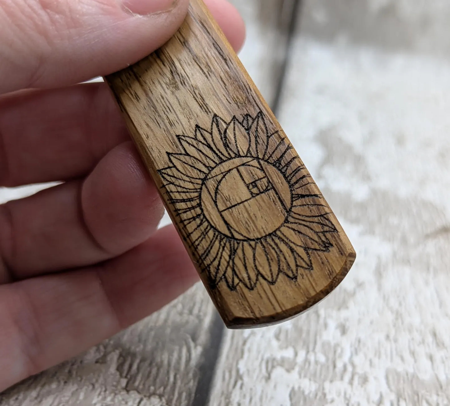 Oak wood pendant with sunflower laser print.
