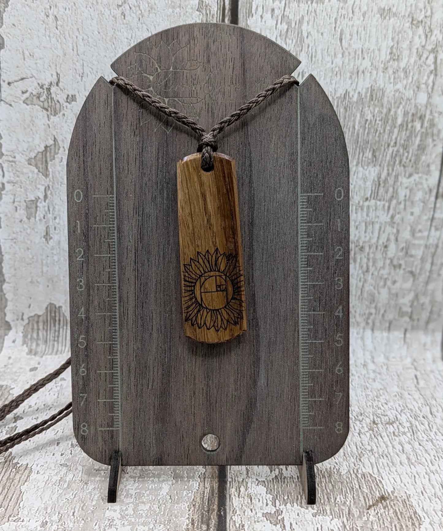 Oak wood pendant with sunflower laser print.