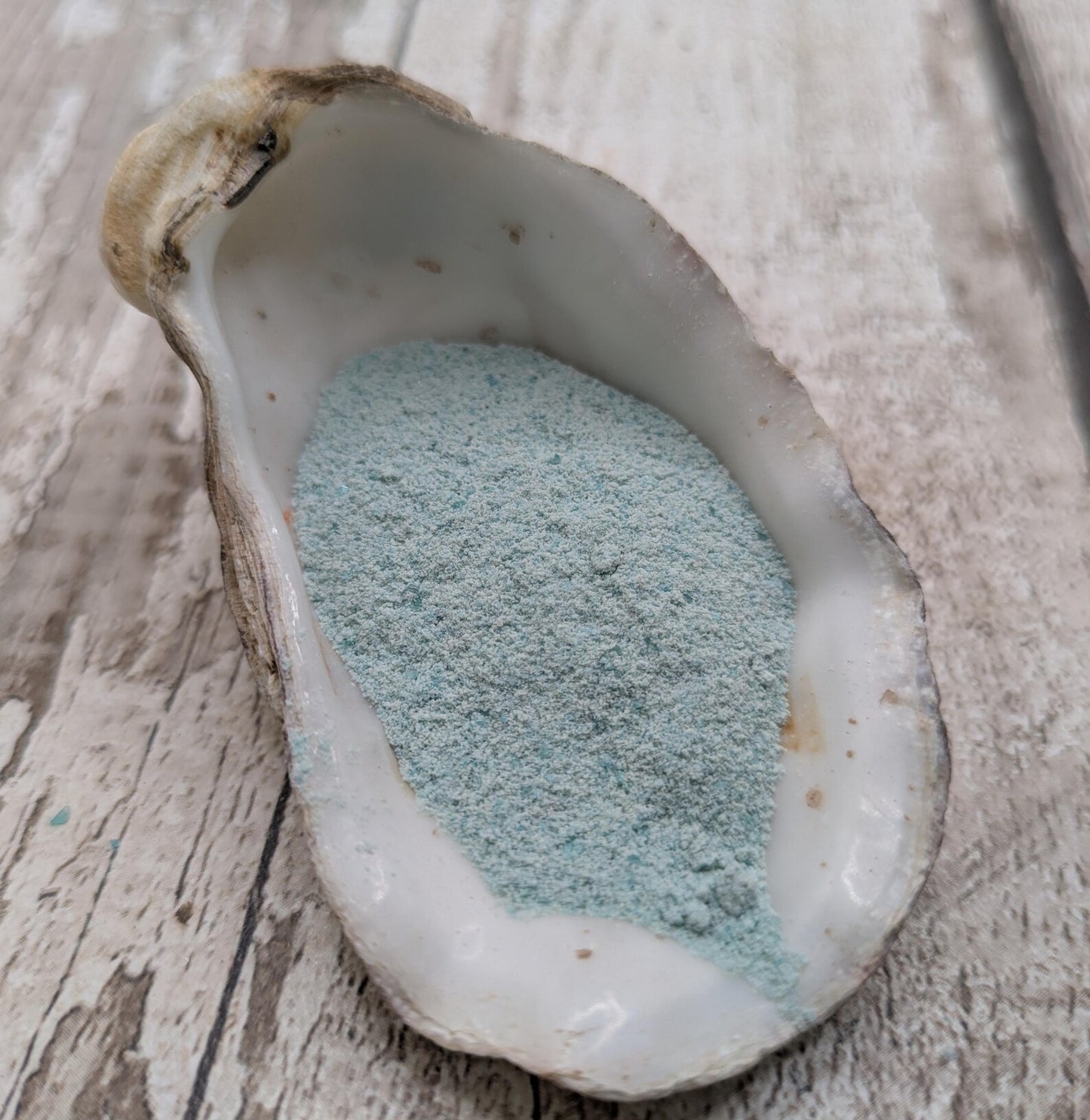 Unrefined powdered amazonite paint pigment.