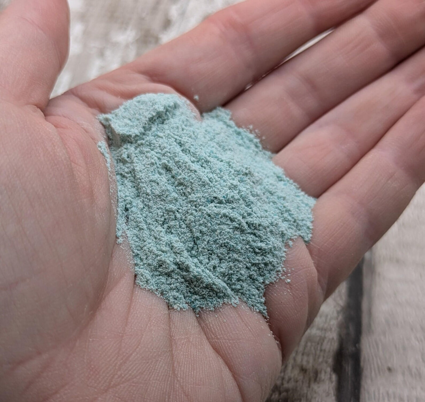 Unrefined powdered amazonite paint pigment.