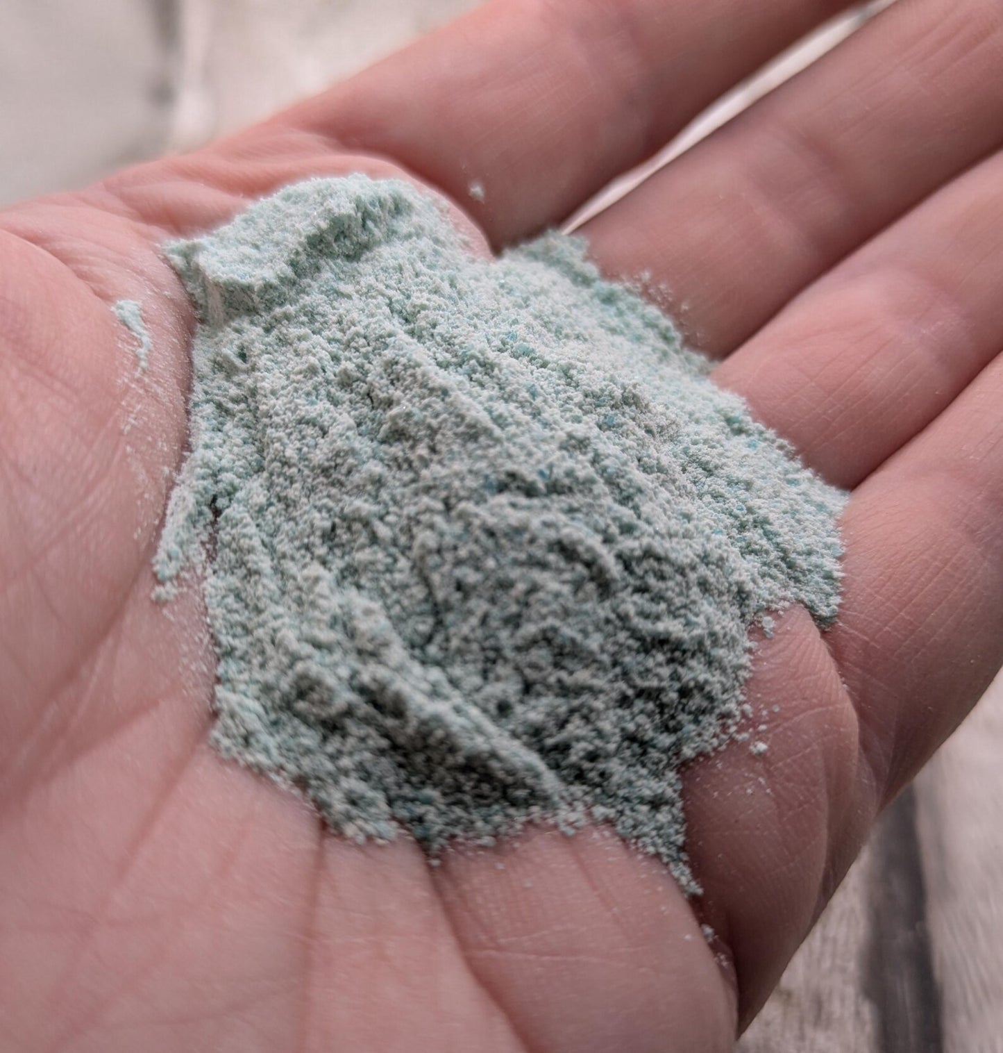 Unrefined powdered amazonite paint pigment.