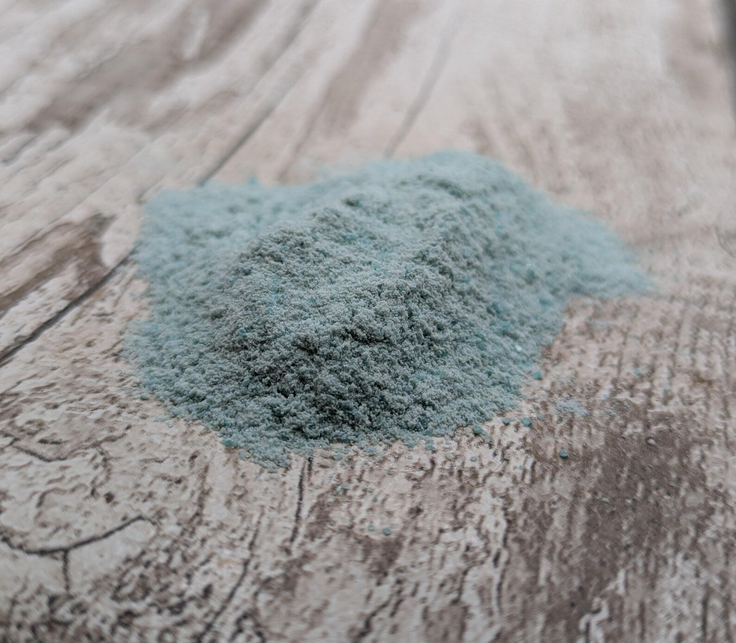 Unrefined powdered amazonite paint pigment.