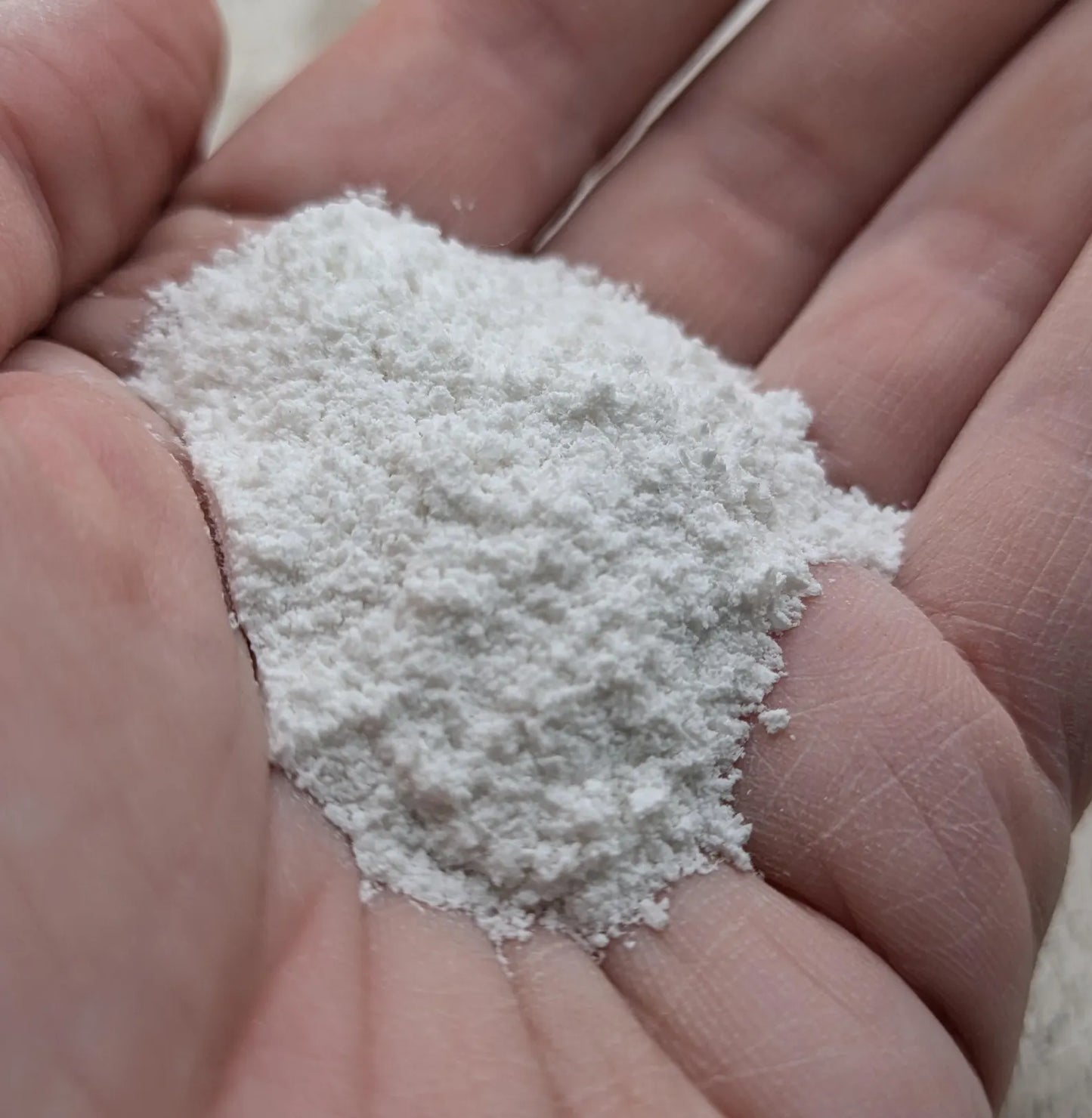 Unrefined powdered satin spar selenite pigment.