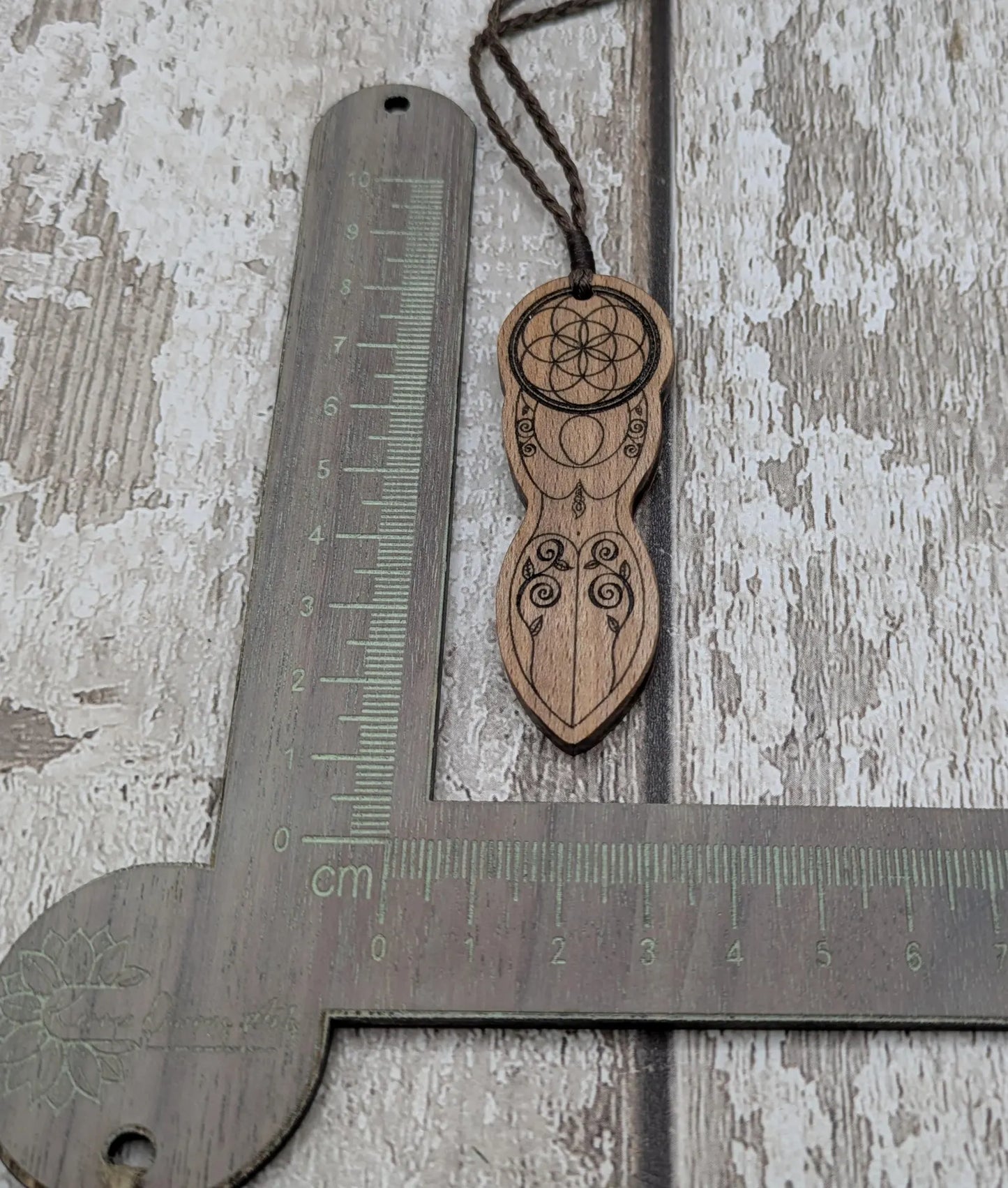 Tulip wood laser printed tattooed goddess pendant.