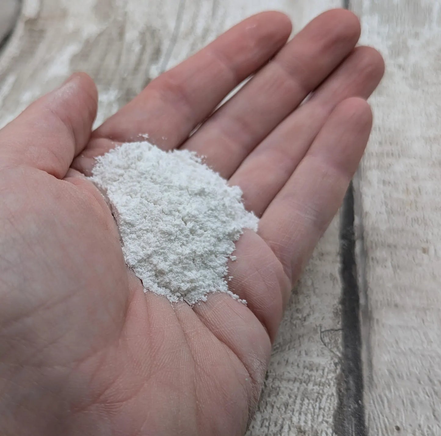 Unrefined powdered satin spar selenite pigment.