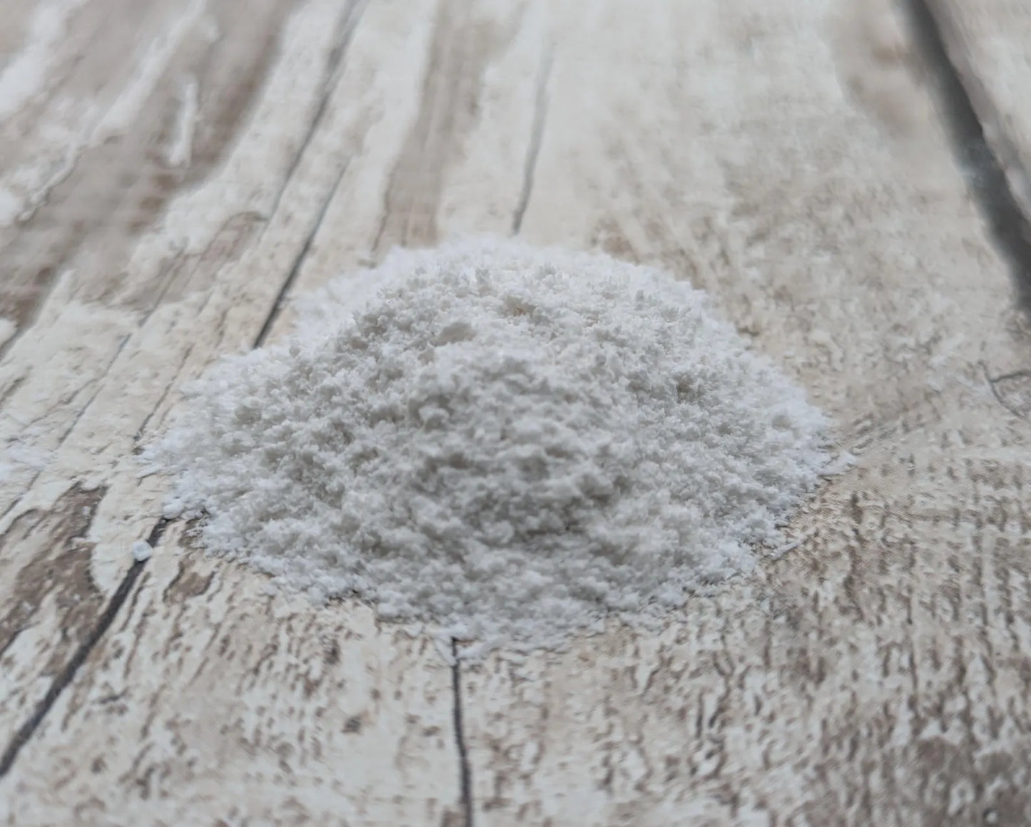 Unrefined powdered satin spar selenite pigment.