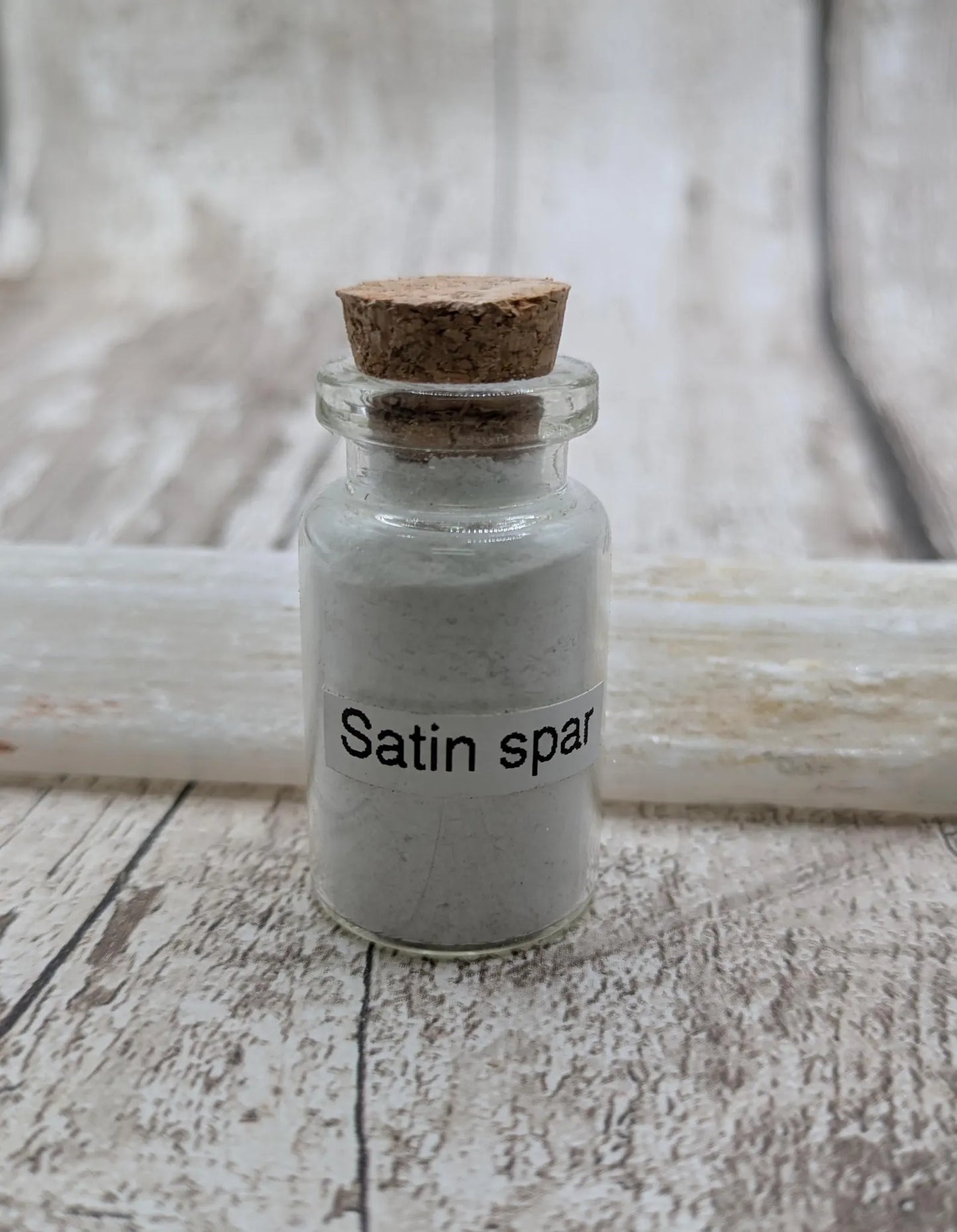 Unrefined powdered satin spar selenite pigment.