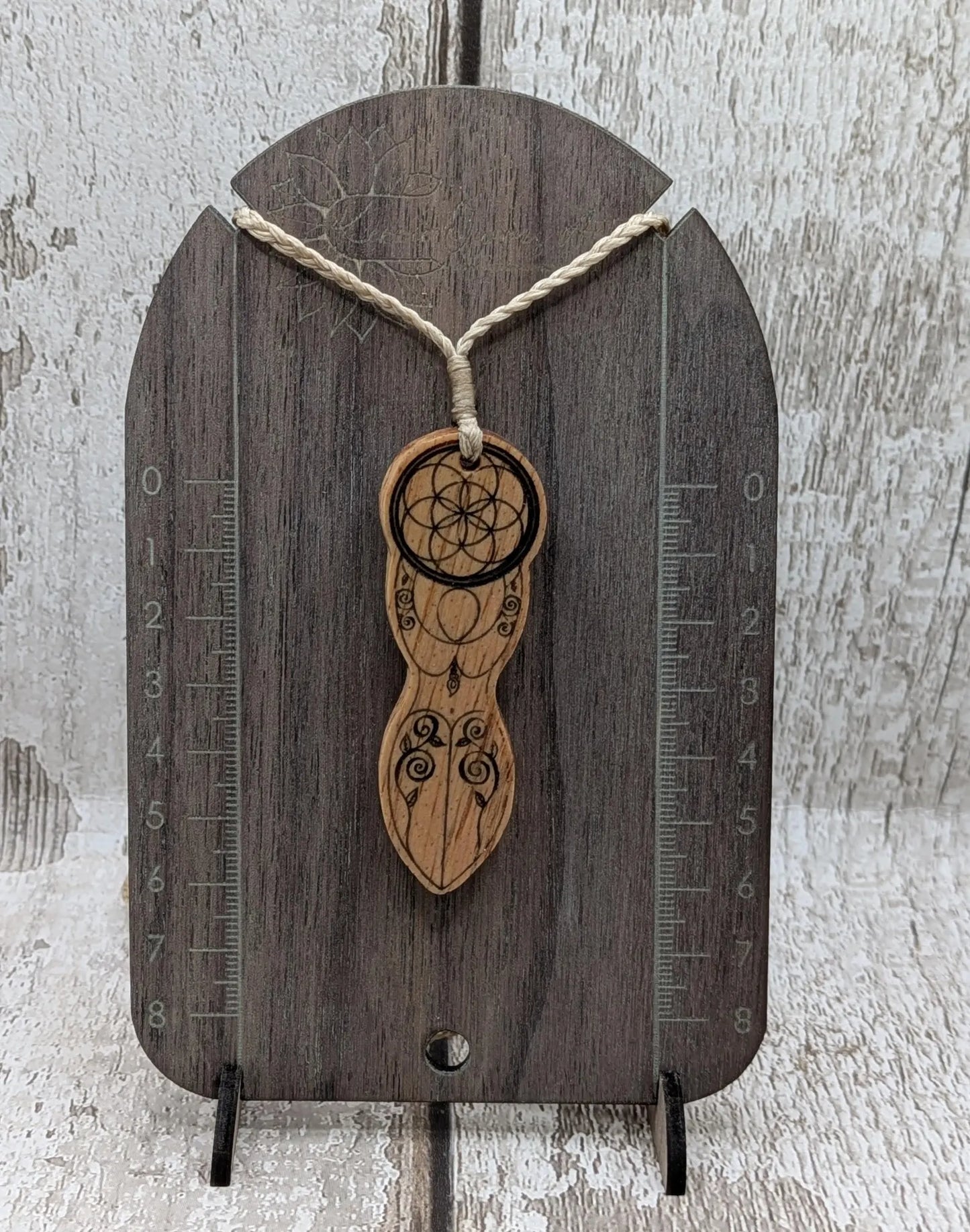 Yew wood tattooed goddess laser printed pendant.