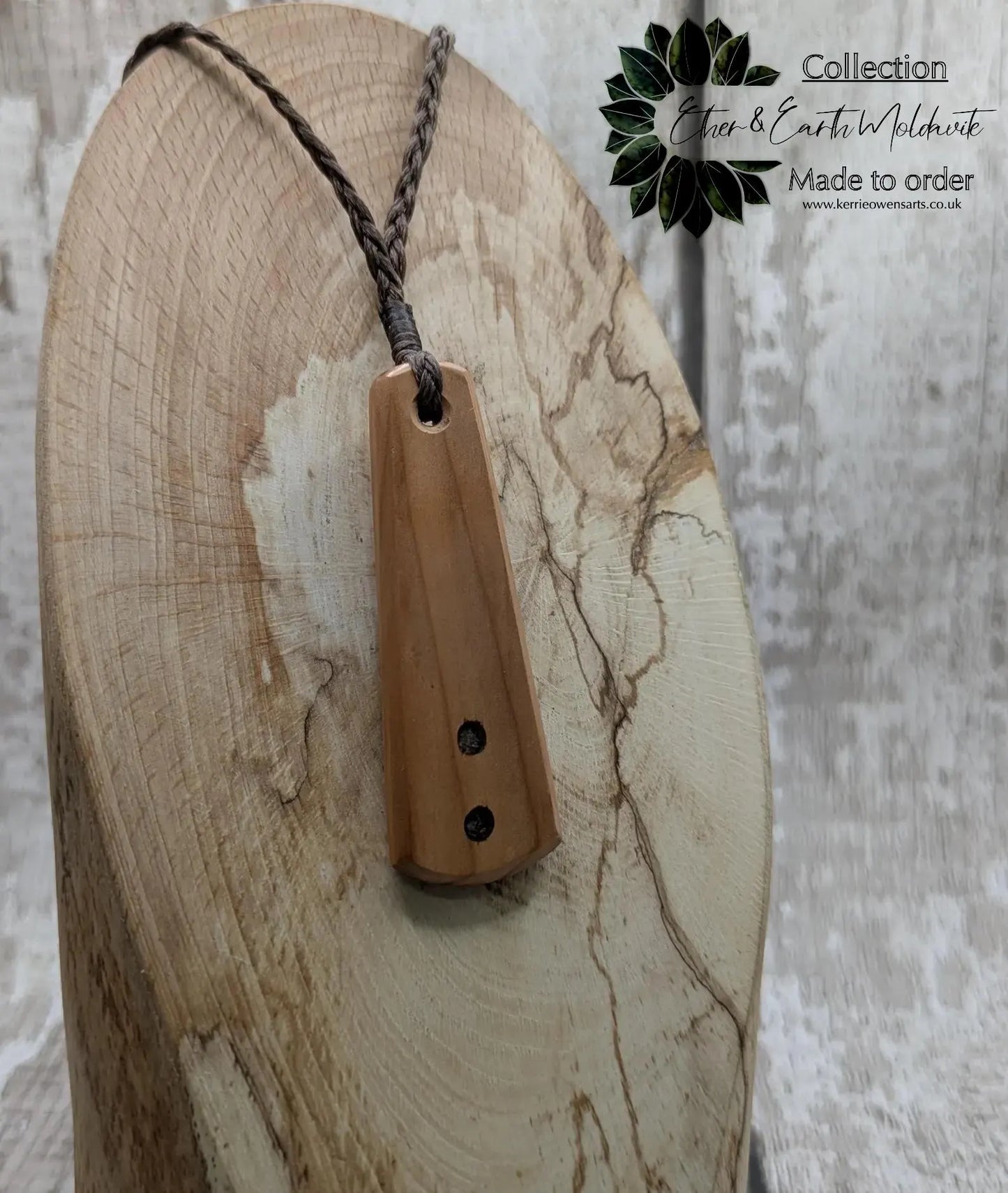 Yew Wood roimata drop pendant with Moldavite Inlay.