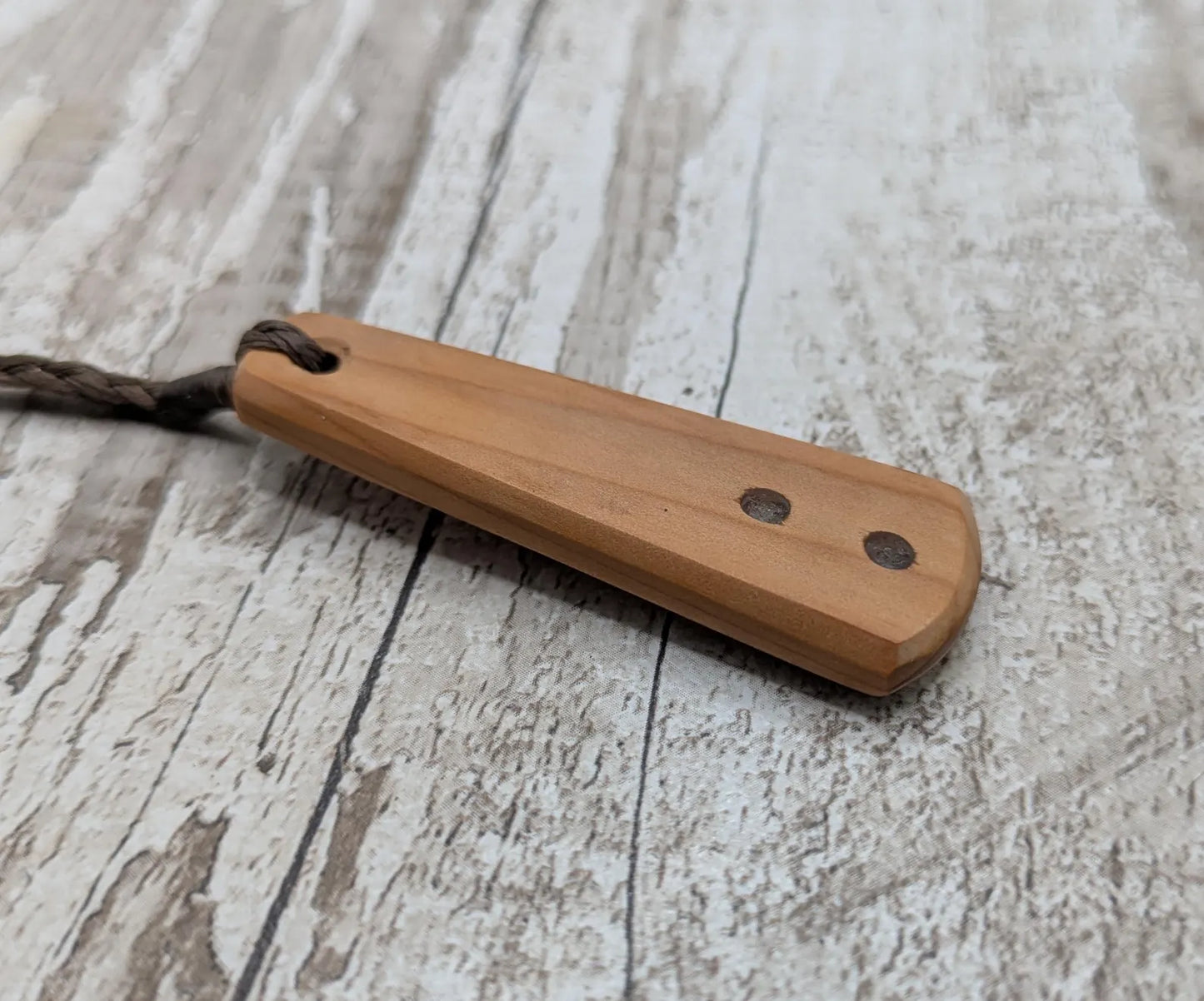 Yew Wood roimata drop pendant with Moldavite Inlay.