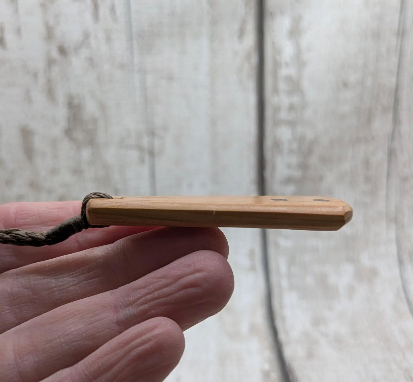 Yew Wood roimata drop pendant with Moldavite Inlay.